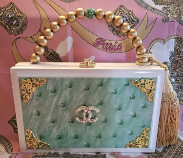 CC Pearl Brooch on Green Ostrich Cigar Box Purse