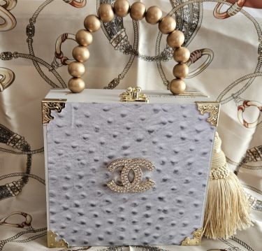 CC Rhinestone Brooch on White Ostrich Cigar Box Purse