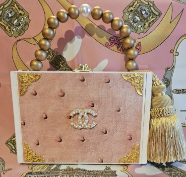 CC Pearl Brooch on Pink Ostrich Cigar Box Purse